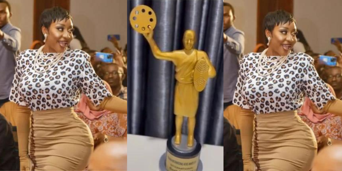 Ini Edo Displays Award She Won At The Rwanda International Movie Awards